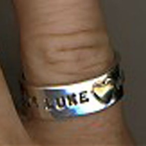 name ring with gold heart
