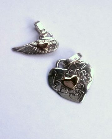 good luck charms
sterling silver and 9 ct gold